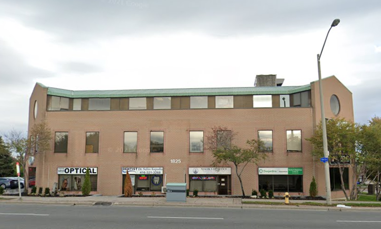 Exterior view of the office building for HMA Canada (Halal Monitoring Authority), located at 1825 Markham Road in Scarborough, a key halal certification agency in Canada.