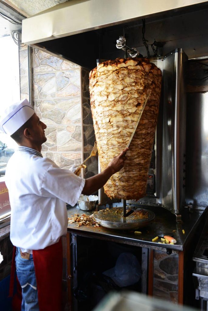 Cutting Shawarma in a popular restaurant in Canada