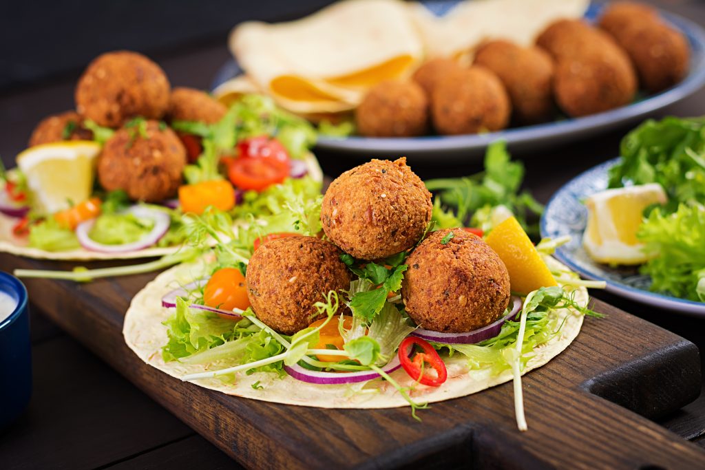  "Fresh Halal falafel platter with veggies – exploring diverse Halal food cultures."