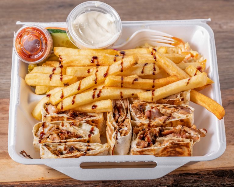 Charcoal chicken shawarma meal on saj bread