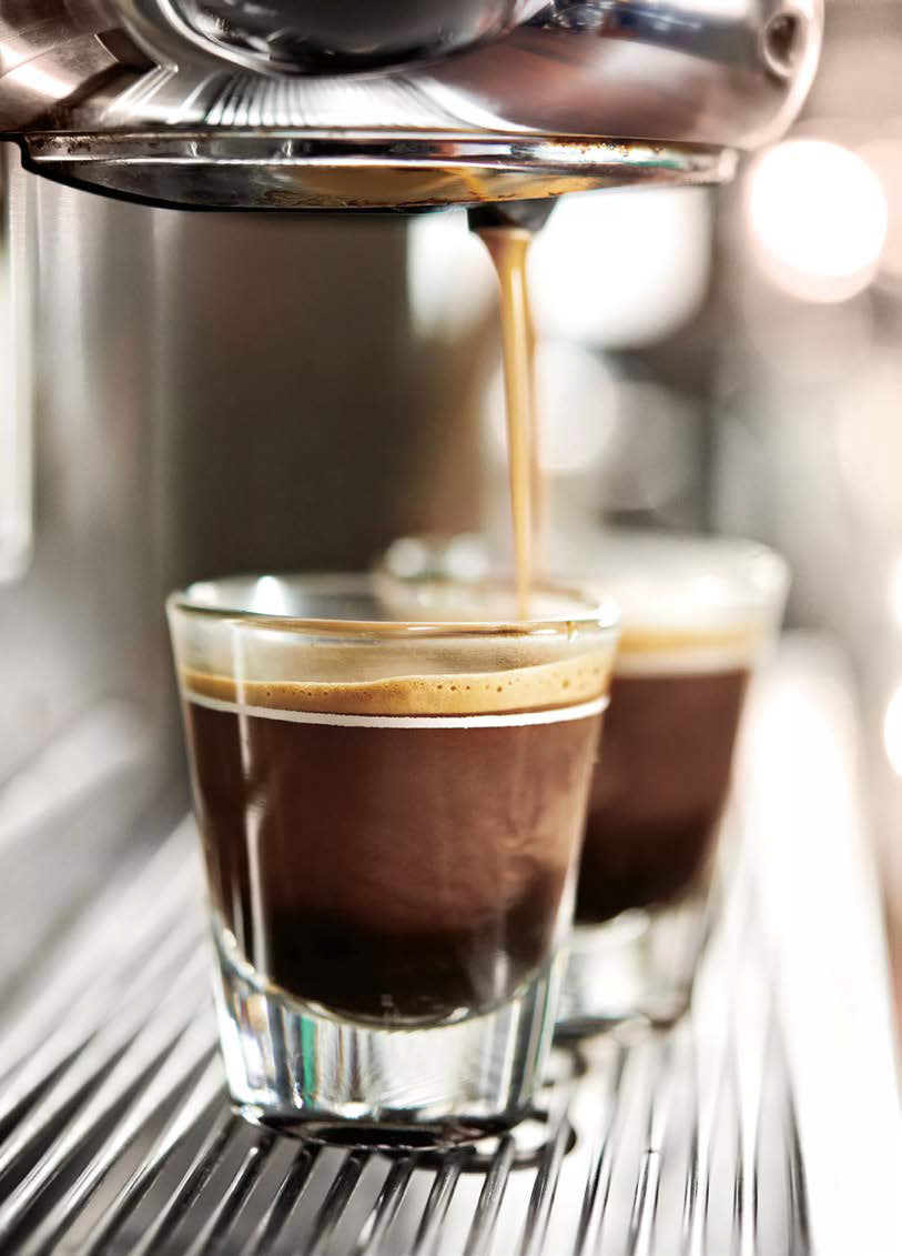 Espresso being poured at Qishr Coffee House