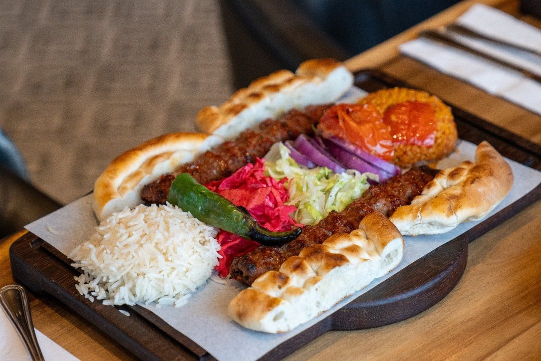 Turkish kebab plate with rice and grilled vegetables