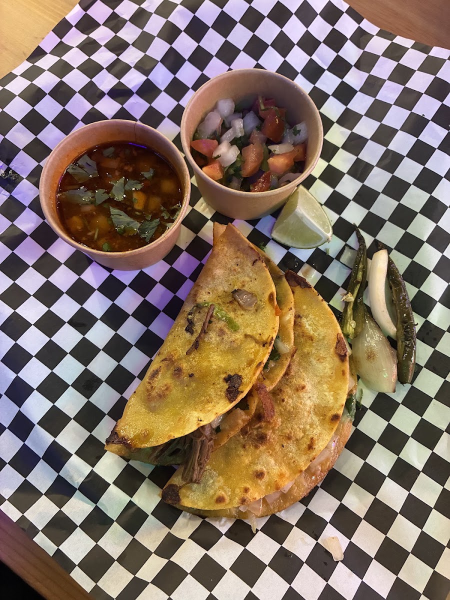 District Tacos logo