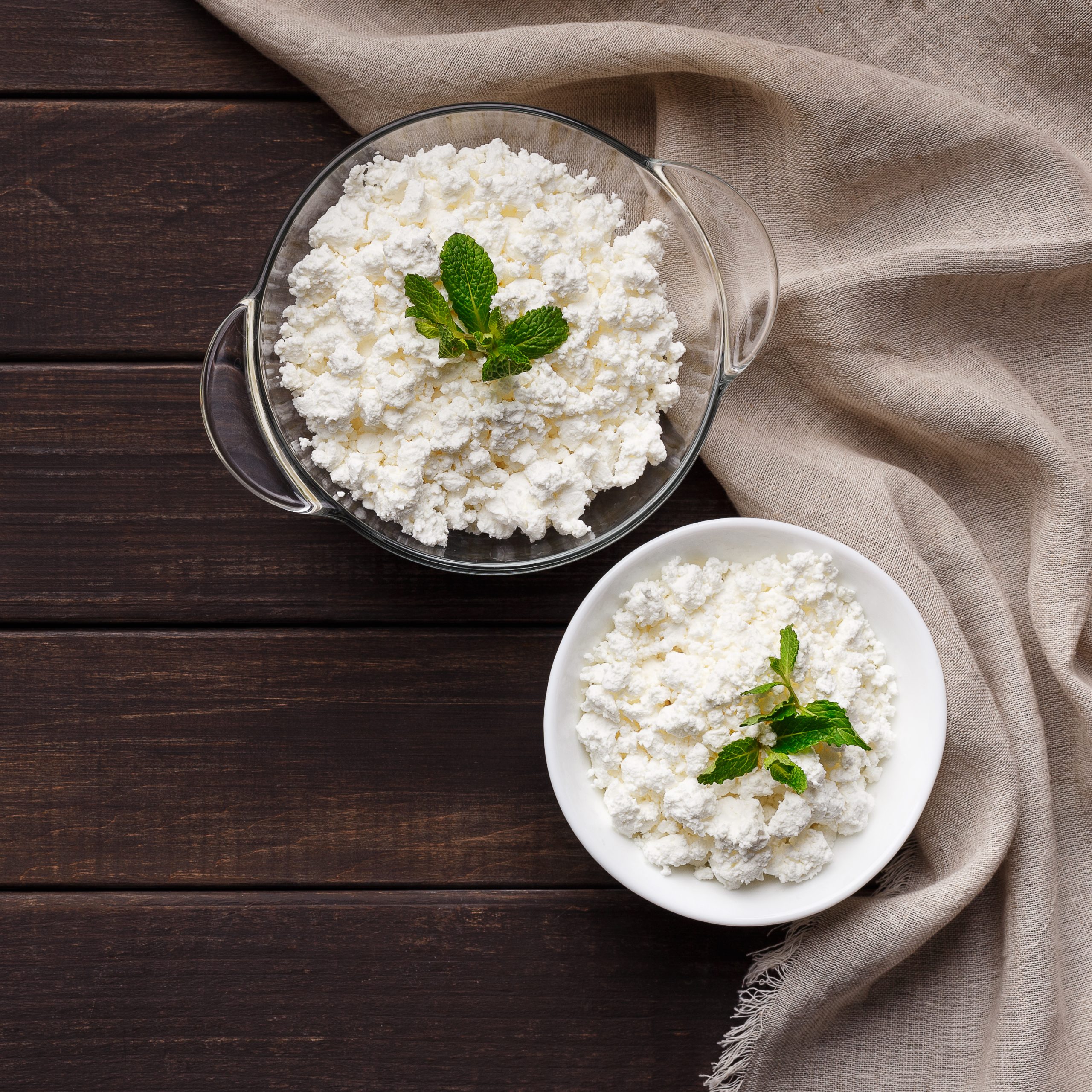 Bowls of cottage cheese garnished with mint